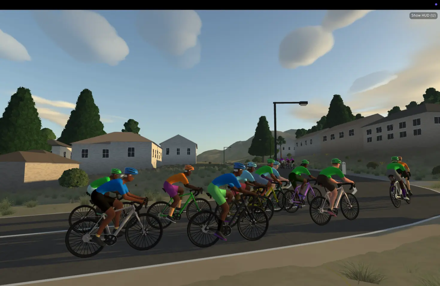 A pack of race bots strung out along a mountain road
